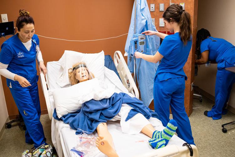 Nursing students in hospital room